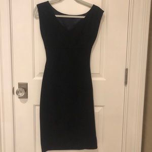 DVF timeless dark navy knit dress w/ side zipper. Flattering fit.